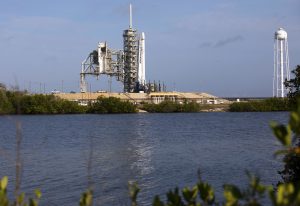 As a Falcon 9 rocket stands ready for liftoff at the Kennedy Space Center's Launch Complex 39A. The rocket will boost a Dragon resupply spacecraft to the International Space Station. Liftoff is scheduled for 5:55 p.m. EDT. On its 11th commercial resupply services mission to the space station, Dragon will bring up 6,000 pounds of supplies, such as the Neutron star Interior Composition Explorer, or NICER, instrument to study the extraordinary physics of neutron stars.
